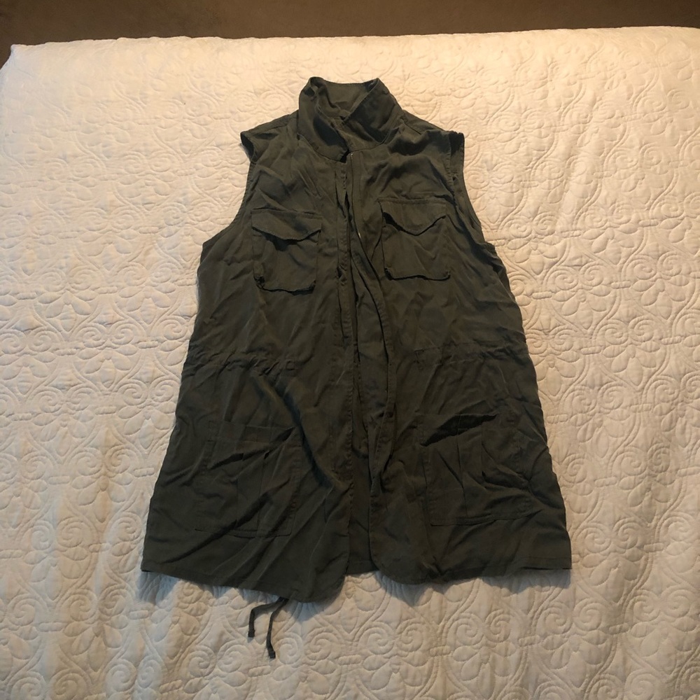 Army green zip up vest.